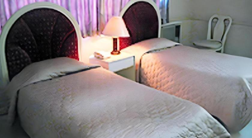 Richmond Plaza Hotel Tabok Esterno foto